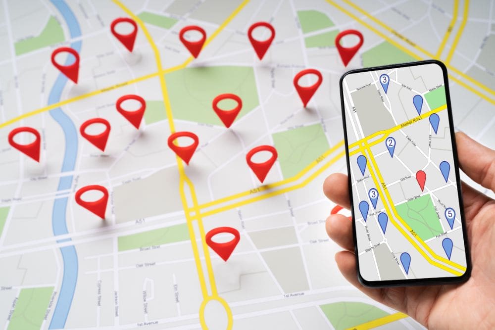 Local SEO map showing location pins and a mobile phone