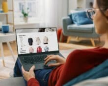 affiliate marketing vs dropshipping, lady on laptop assessing the teo methods