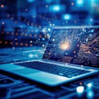 Essential SEO tools featured image of laptop with Ai