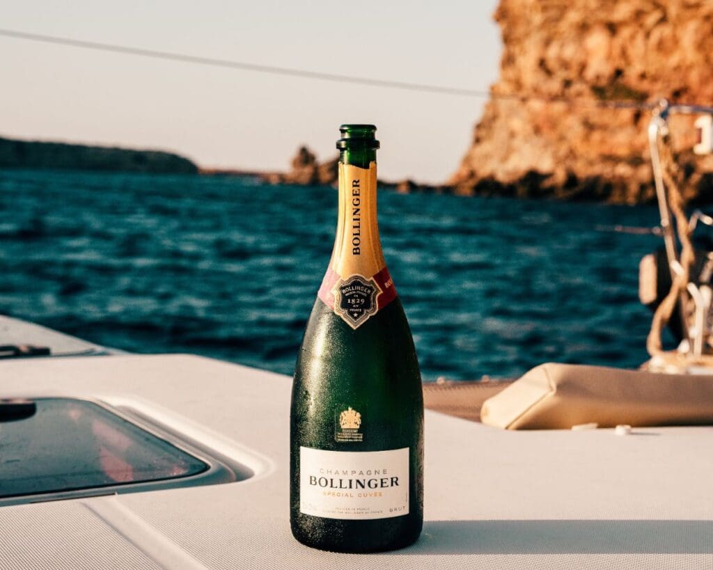 What is High Ticket Digital Marketing? Featured image showing a champagne bottle.