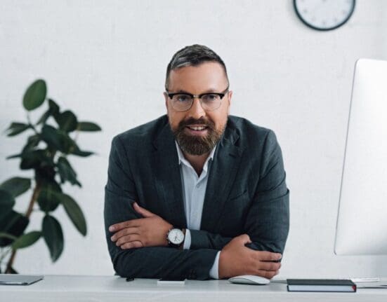 What to Ask SEO Consultants: 22 Critical Questions featured image - SEO Consultant at an interview.