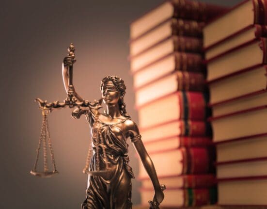 justice scales with books