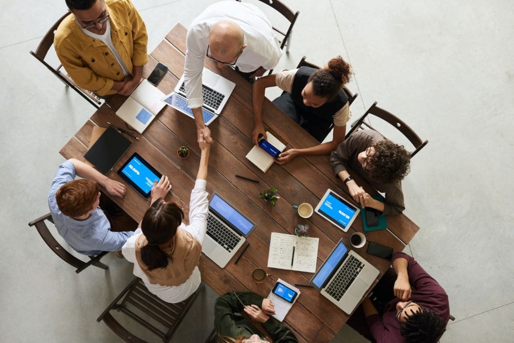 A group of people discussing influencer marketing strategy and setting goals