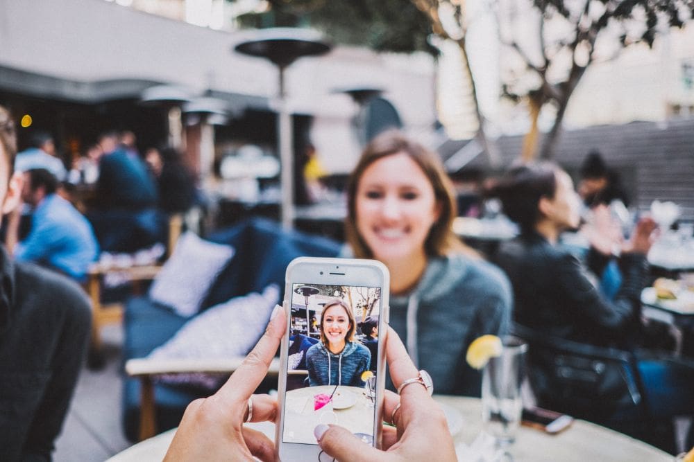 Woman has her photo taken to add to social media
